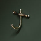 Mitchell Hardware Supply Luma Hook in unlacquered satin brass finish for wall mounting